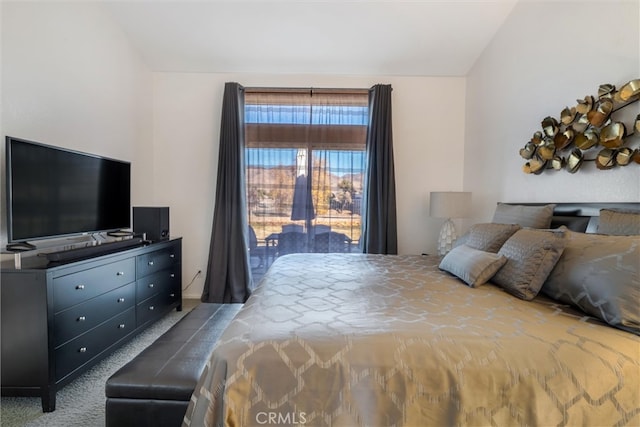 bedroom featuring carpet and access to outside