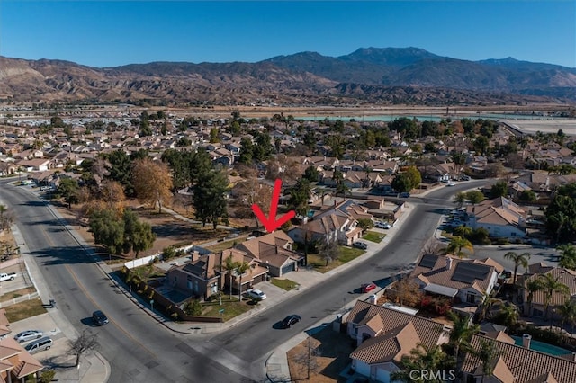 drone / aerial view featuring a mountain view