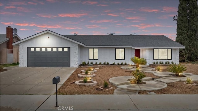 view of front of property featuring a garage