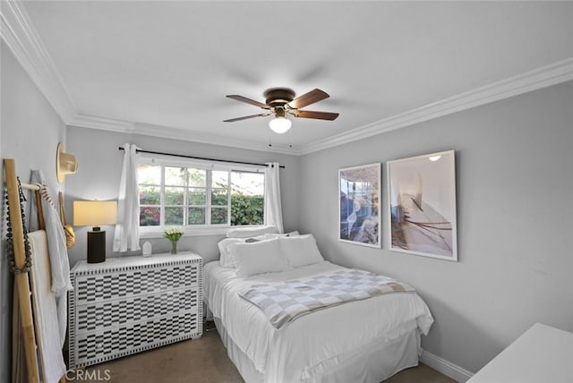 bedroom featuring ceiling fan and ornamental molding