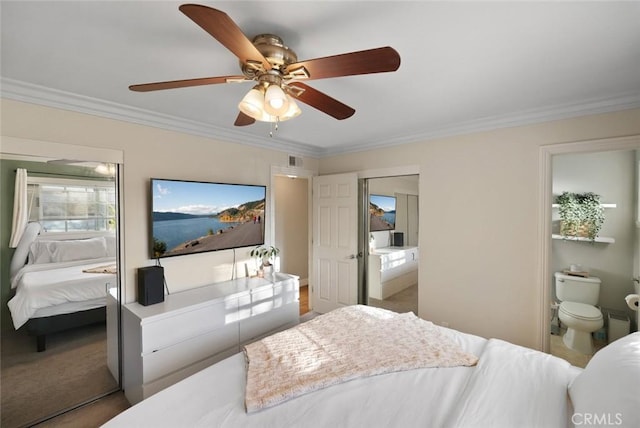 bedroom featuring ensuite bath, ceiling fan, and ornamental molding