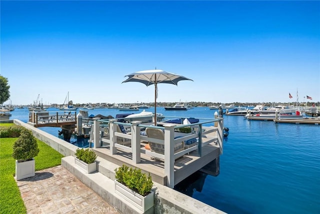 dock area featuring a water view