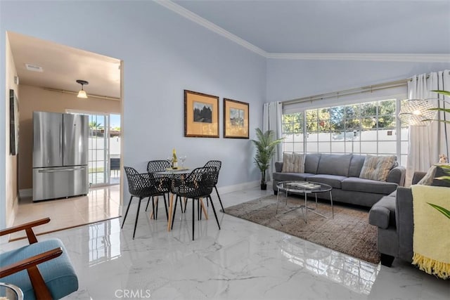 living room with a healthy amount of sunlight and ornamental molding