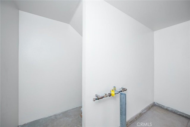 bathroom featuring concrete floors