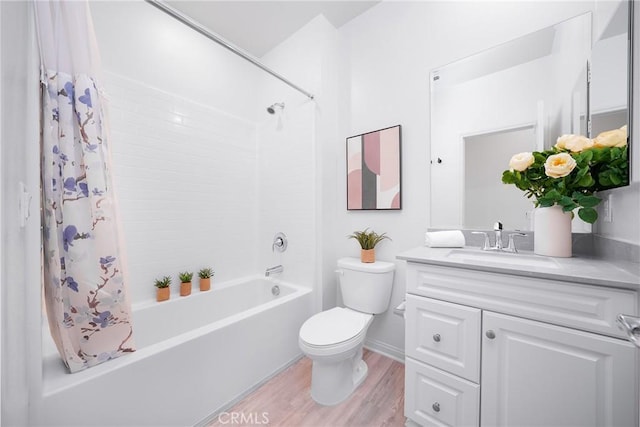 full bathroom with toilet, wood-type flooring, shower / bathtub combination with curtain, and vanity