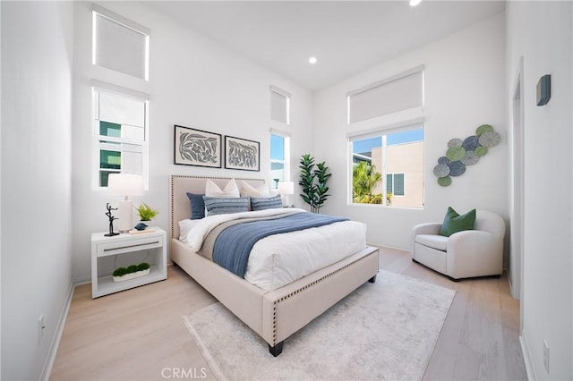 bedroom with light wood-type flooring