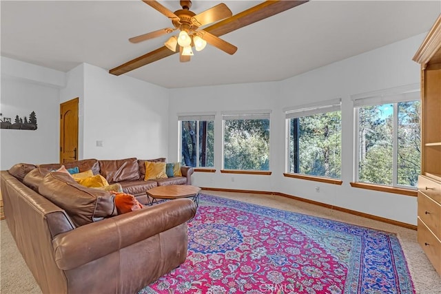 living room with light carpet and ceiling fan