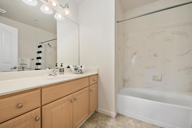 bathroom featuring shower / bath combo with shower curtain and vanity