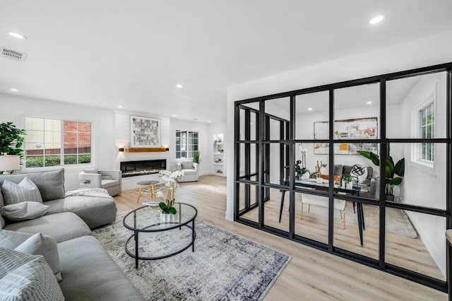 living room featuring light wood-type flooring