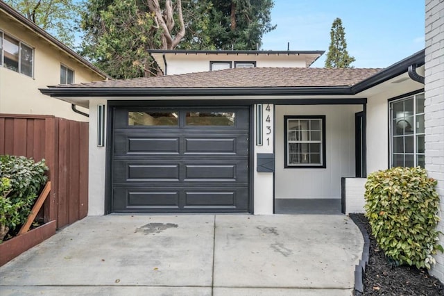 exterior space with a garage