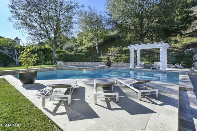 view of pool with a patio and a pergola