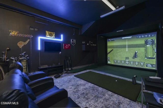 cinema room featuring golf simulator and carpet floors