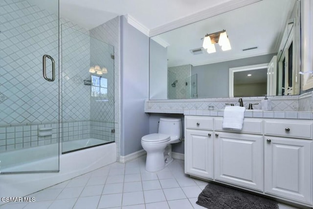 full bathroom featuring toilet, combined bath / shower with glass door, decorative backsplash, crown molding, and tile patterned floors