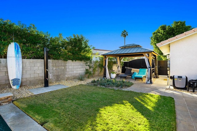 view of yard with a gazebo and a patio