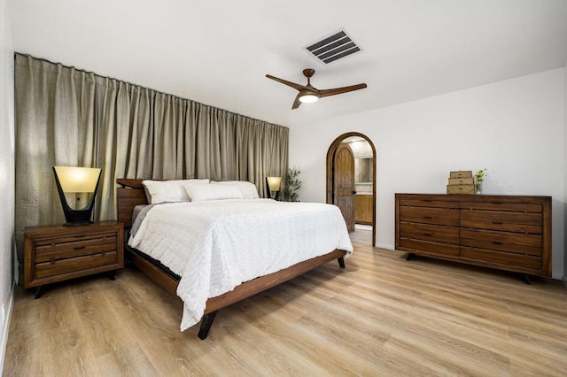 bedroom with ceiling fan and light hardwood / wood-style flooring