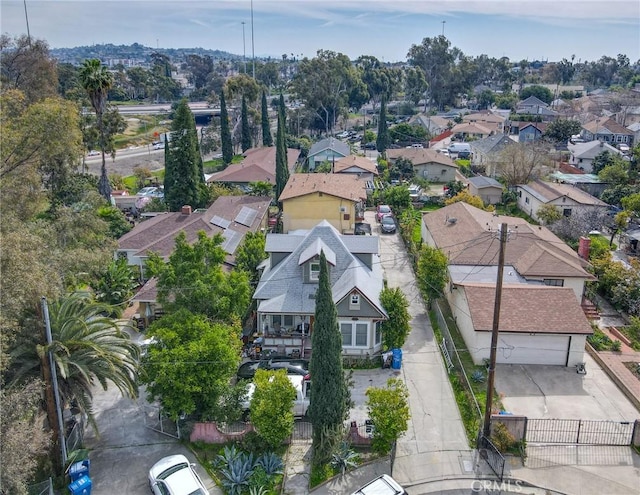 birds eye view of property with a residential view