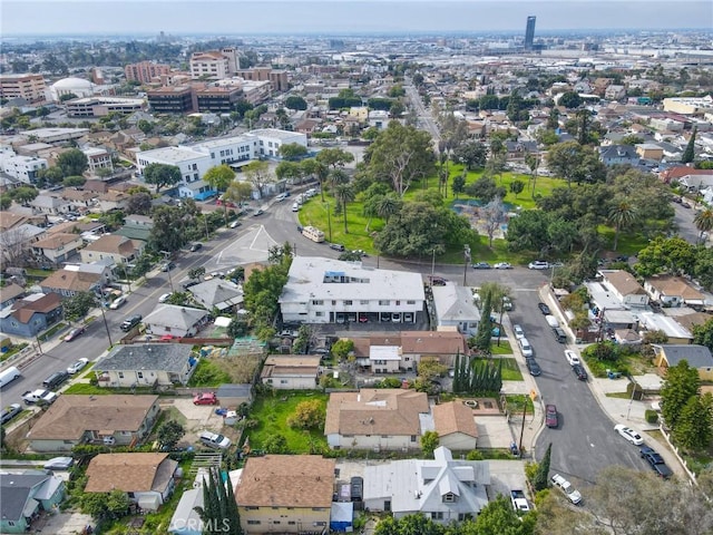 birds eye view of property with a residential view