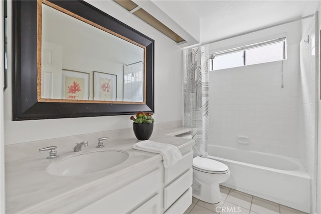 bathroom featuring shower / tub combo, vanity, toilet, and tile patterned floors