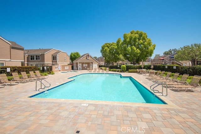 view of pool featuring a patio area