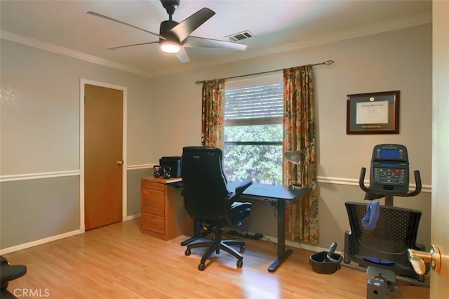 office space with ceiling fan, light wood-type flooring, and crown molding