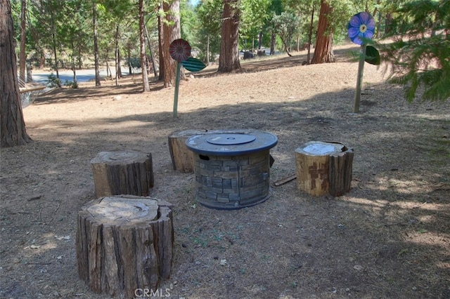 exterior space with an outdoor fire pit