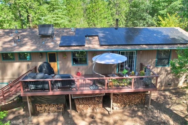 36555 Mudge Ranch Rd, Coarsegold, CA 93614 - back of house with crawl space, roof mounted solar panels, a wooden deck, and outdoor dining space