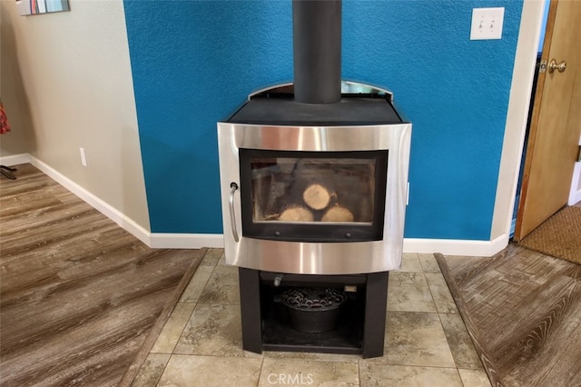 36555 Mudge Ranch Rd, Coarsegold, CA 93614 - detailed view of a wood stove and wood finished floors