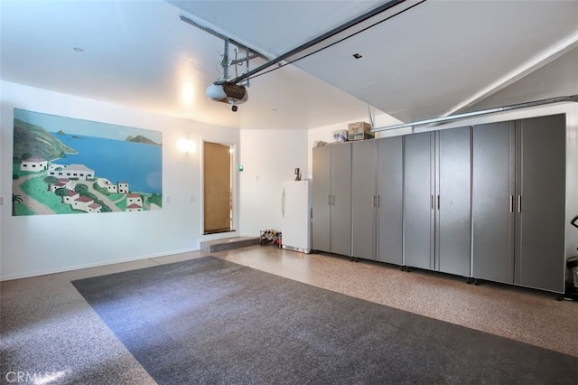 36555 Mudge Ranch Rd, Coarsegold, CA 93614 - garage featuring freestanding refrigerator and a garage door opener
