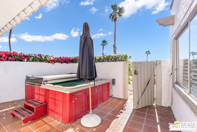 view of patio featuring a hot tub