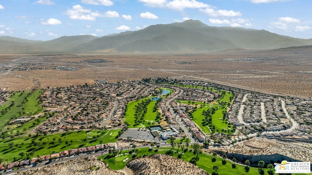 drone / aerial view featuring a mountain view