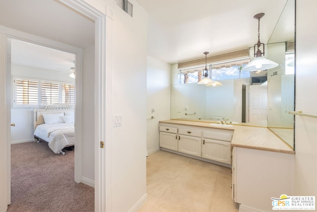 bathroom with vanity and ceiling fan