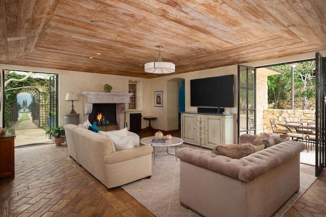 living room with wooden ceiling