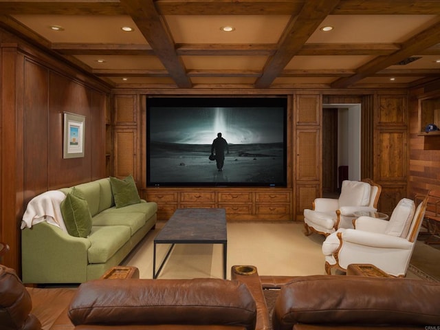 carpeted home theater with coffered ceiling, beamed ceiling, and wooden walls