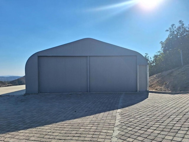 view of outdoor structure with a garage