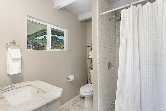 bathroom featuring toilet, tile patterned floors, and walk in shower