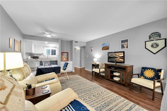 living room featuring dark hardwood / wood-style floors