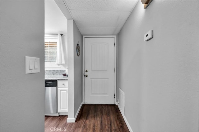 hallway featuring dark hardwood / wood-style flooring