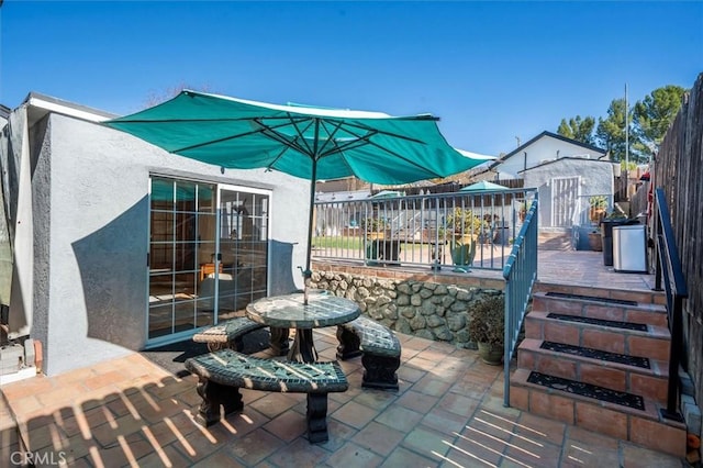 view of patio / terrace with a deck