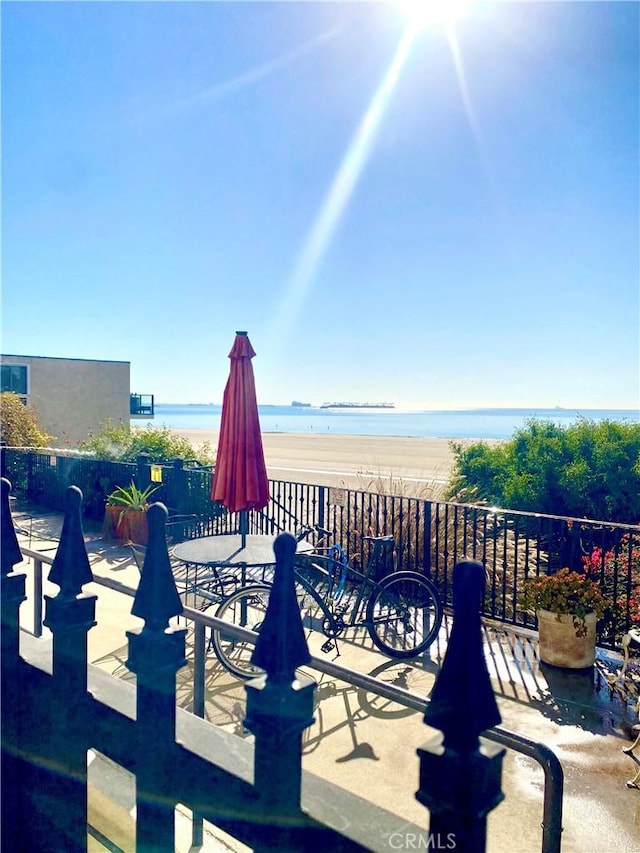 view of patio / terrace featuring a water view