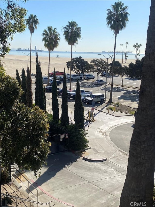 view of home's community with a water view