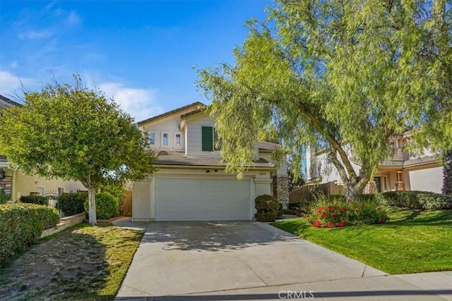 obstructed view of property with a front yard and a garage