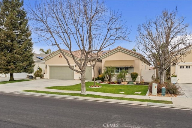 single story home with a front lawn and a garage