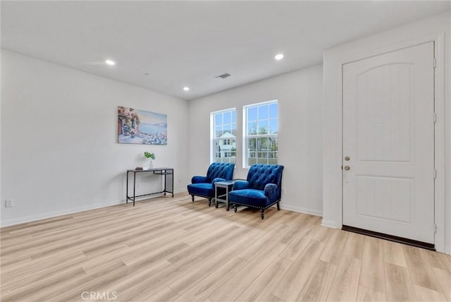 sitting room with light wood-type flooring