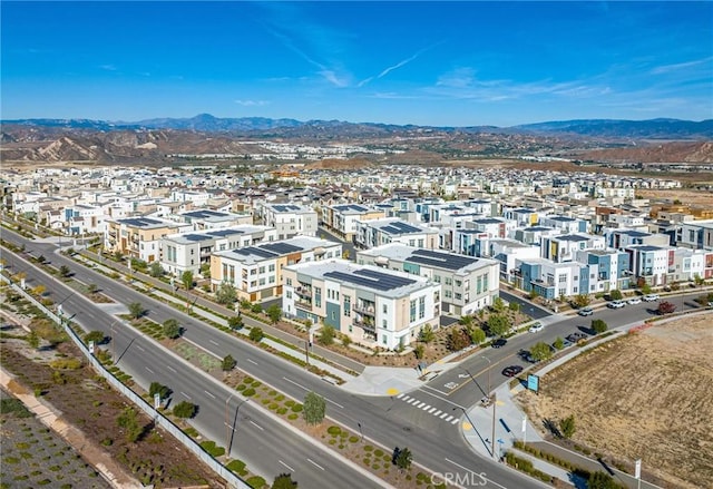 bird's eye view with a mountain view