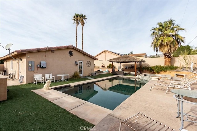 view of pool with a gazebo and a yard