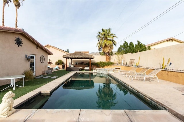 view of swimming pool with a gazebo and a patio