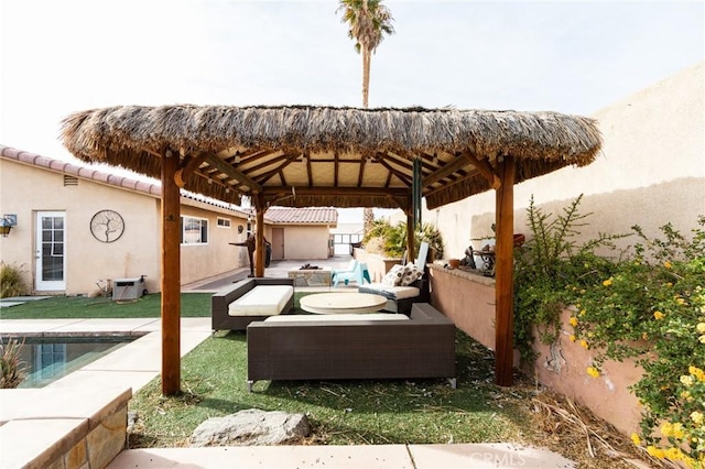 view of patio featuring a gazebo and outdoor lounge area