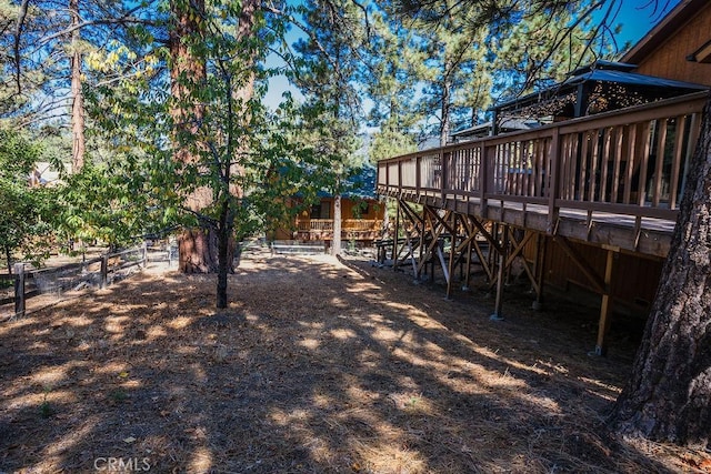 view of yard featuring a deck