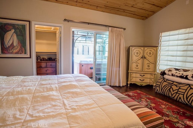 bedroom with access to exterior, wooden ceiling, dark hardwood / wood-style floors, lofted ceiling, and a walk in closet