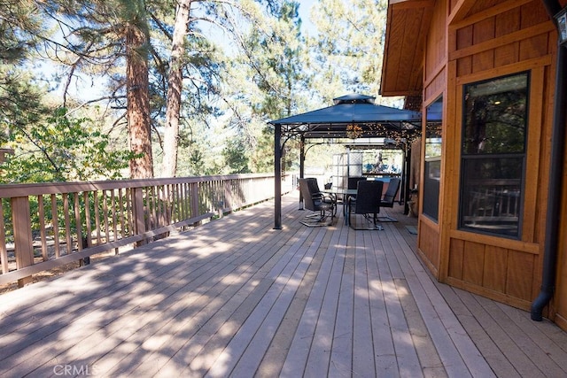 wooden deck with a gazebo